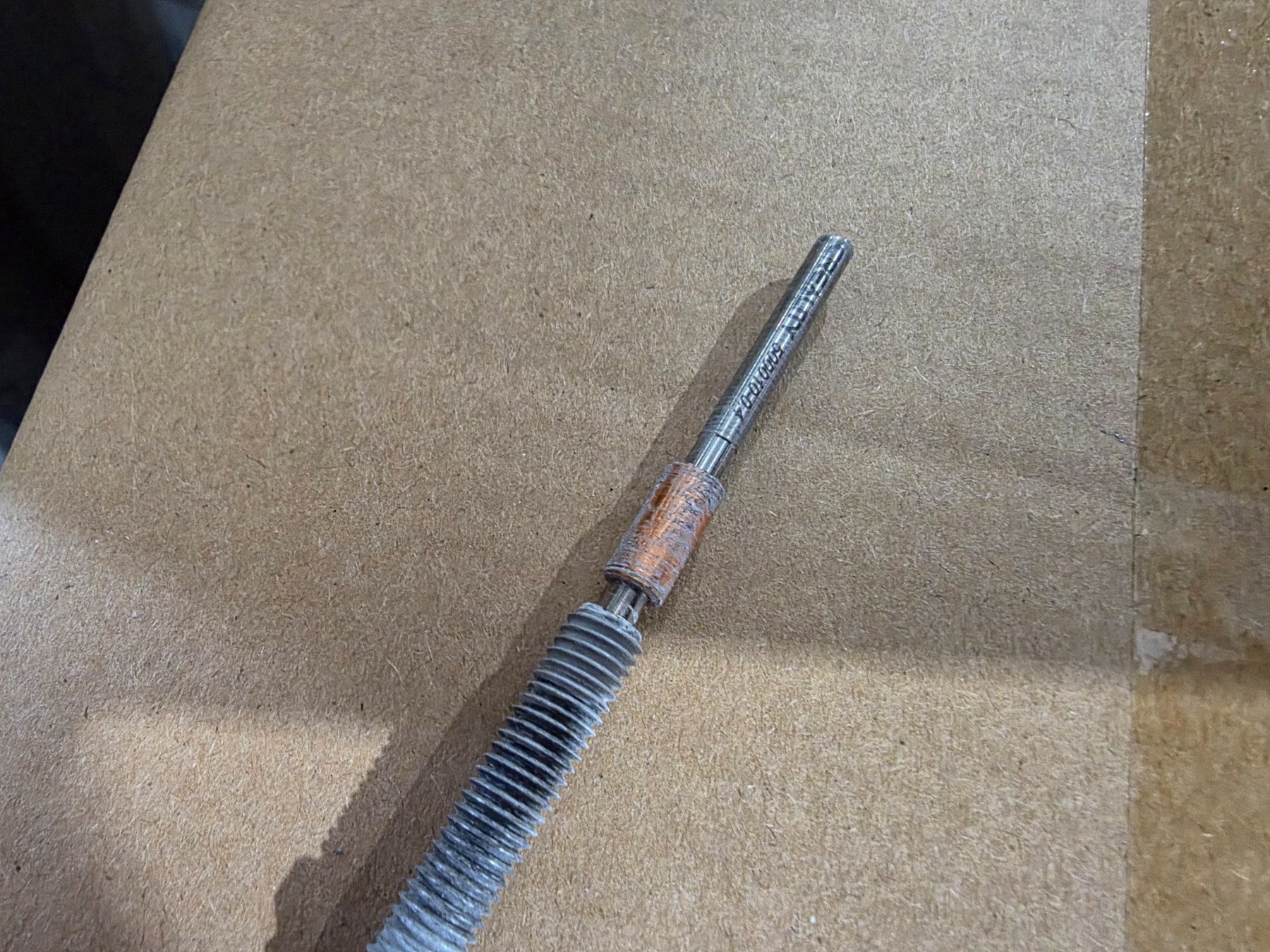 K2 Plus hotend component showing dried or insufficient thermal interface material during heat creep troubleshooting.